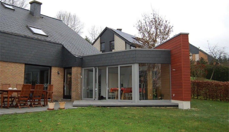 Remplacement de double vitrage et réparation-dépannage de vitrage sur immeuble en Belgique.